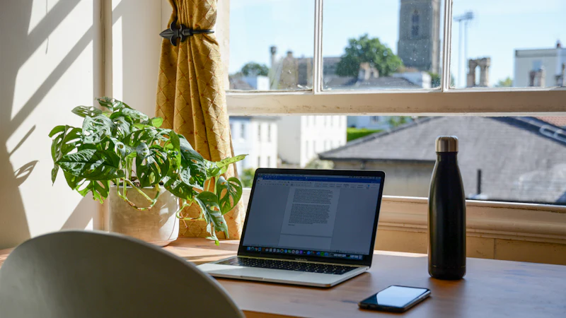 Laptop set up in a home office for remote work