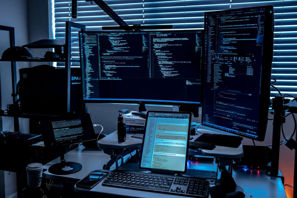 Security monitoring desk with multiple screens