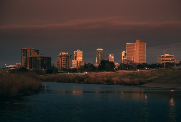 Fort Worth skyline at dusk above the Trinity River