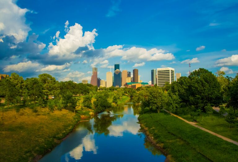 Houston skyline above the trees along Buffalo Bayou