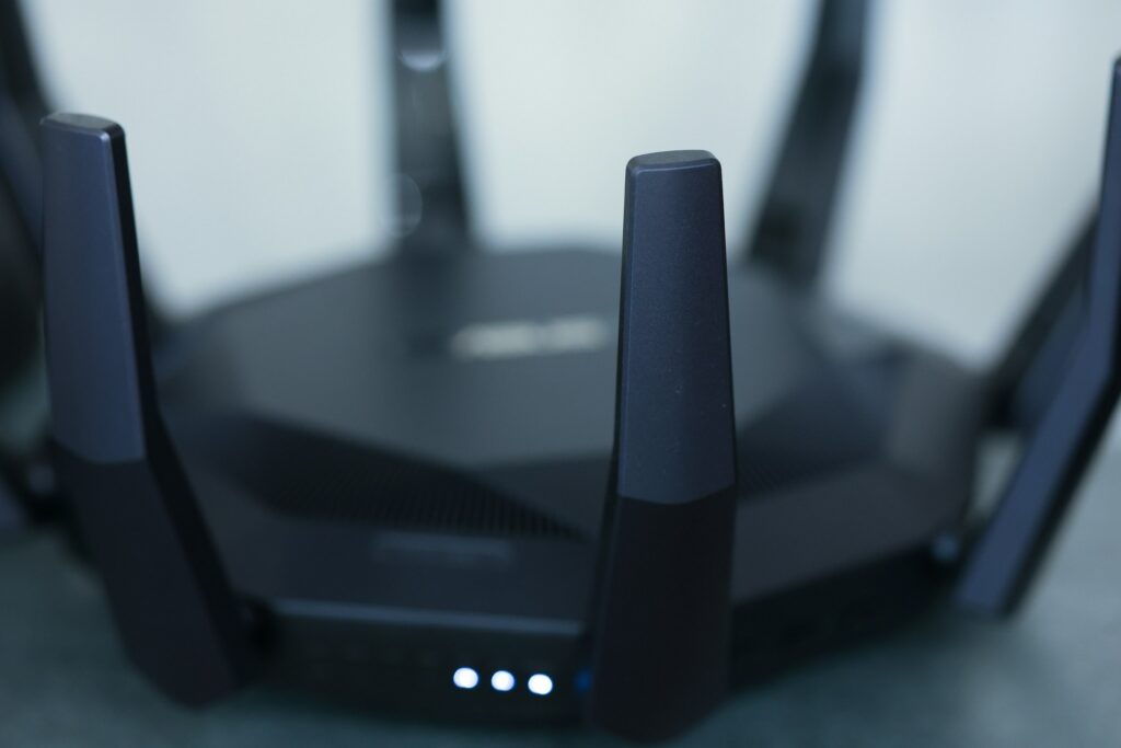 Close-up of a wireless router with antennas