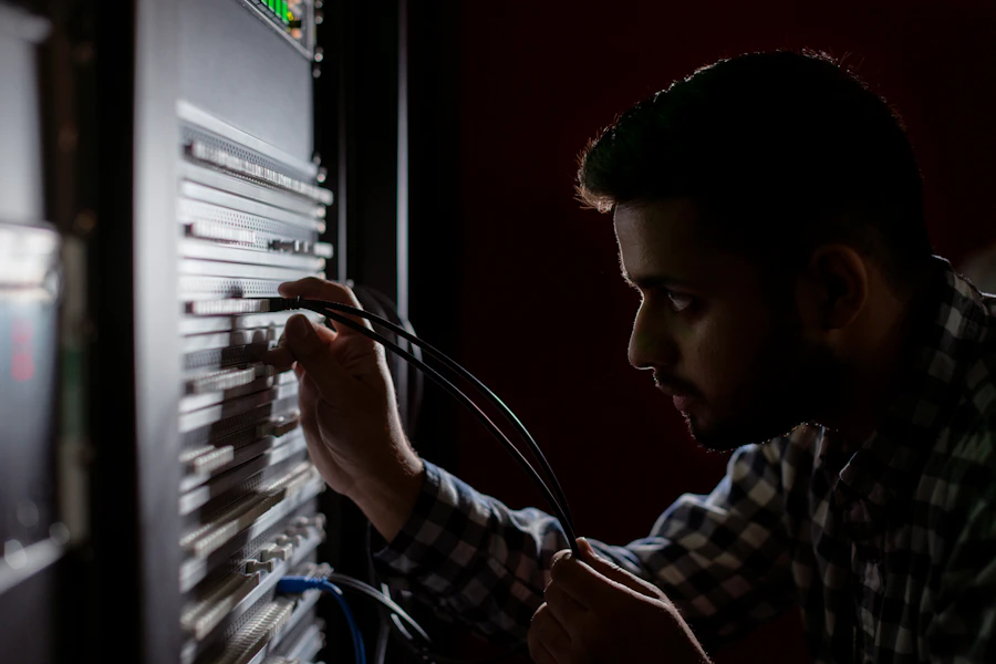 IT technician working on server equipment